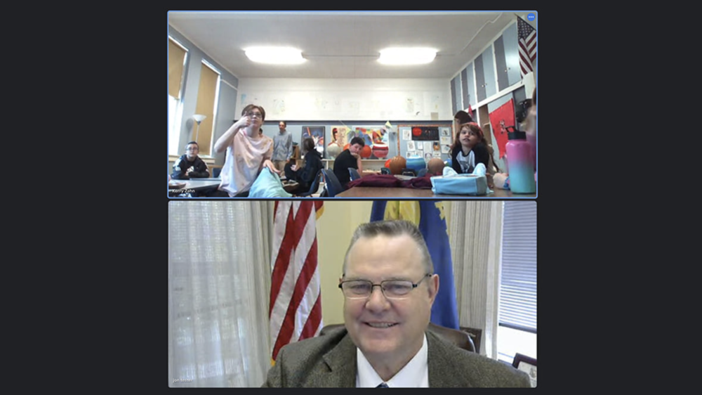 John Tester and Alberton 5th and 6th graders are watching each other on a Zoom call